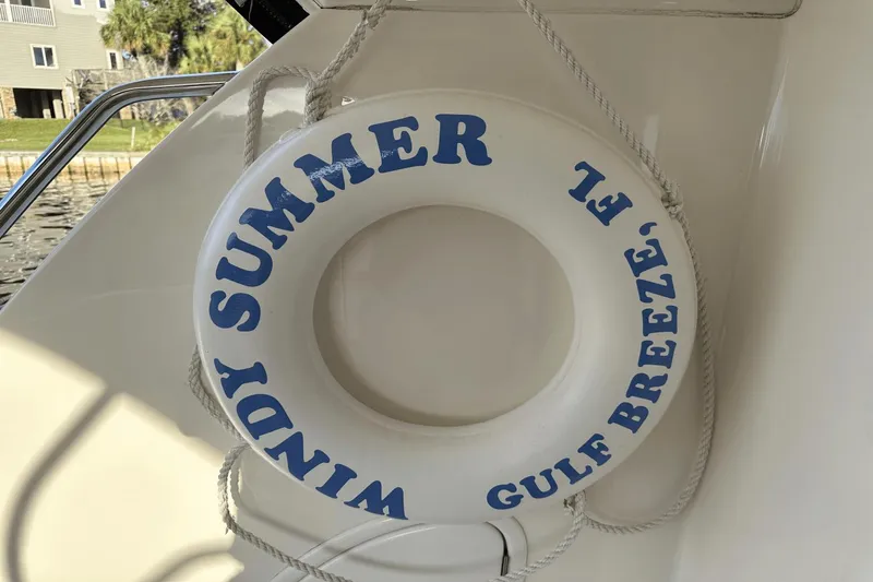  Yacht Photos Pics Life ring on 2015 Meridian 441 Sedan, labeled "Windy Summer, Gulf Breeze, FL."