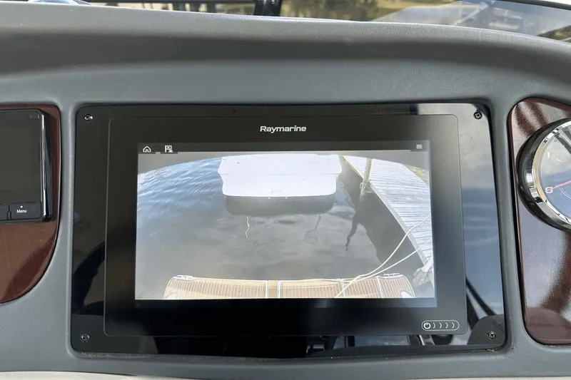  Yacht Photos Pics Raymarine display on 2015 Meridian 441 Sedan showing rear view of docked boat.