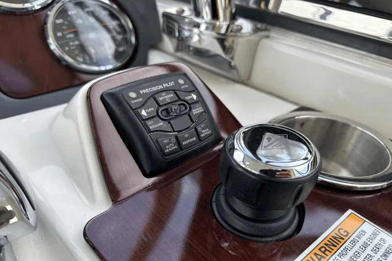  Yacht Photos Pics Control panel of a 2015 Meridian 441 Sedan boat with precision pilot system.