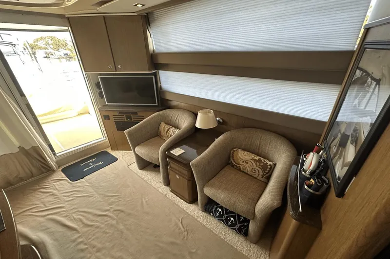  Yacht Photos Pics Interior of 2015 Meridian 441 Sedan yacht with cozy seating and modern decor.