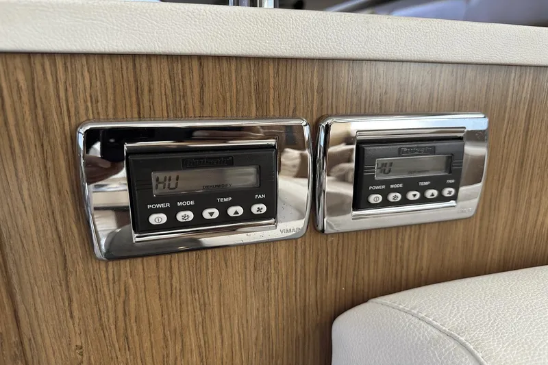  Yacht Photos Pics Digital control panels on a 2015 Meridian 441 Sedan yacht interior.