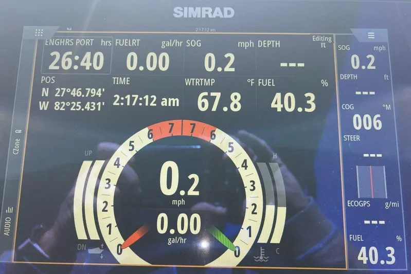  Yacht Photos Pics Digital display of Premier 330 Escalante boat dashboard showing navigation and engine data.