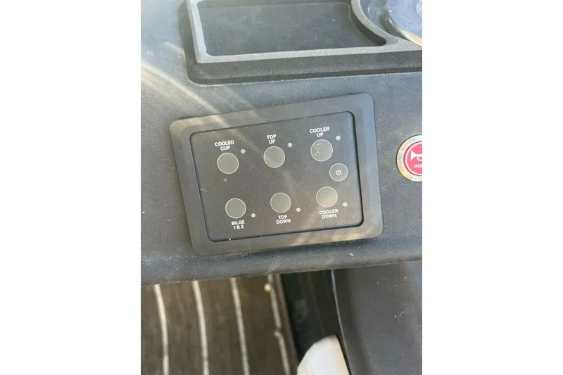  Yacht Photos Pics Control panel of 2023 Premier 330 Escalante boat with various function buttons.