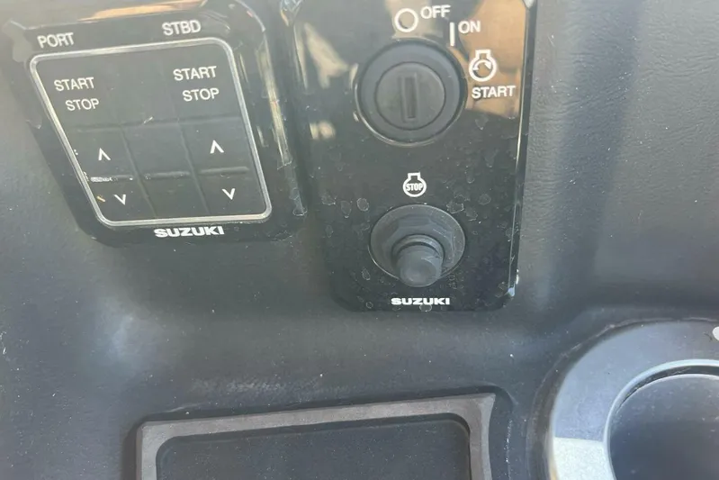  Yacht Photos Pics Control panel of a 2023 Premier 330 Escalante with Suzuki start-stop buttons.