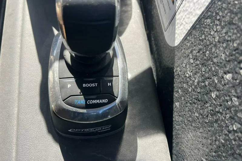  Yacht Photos Pics Close-up of a 2023 Premier 330 Escalante control lever with "Optimus 360" branding.