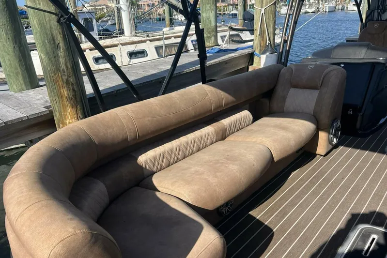 Yacht Photos Pics Luxurious seating on 2023 Premier 330 Escalante boat, docked at marina.