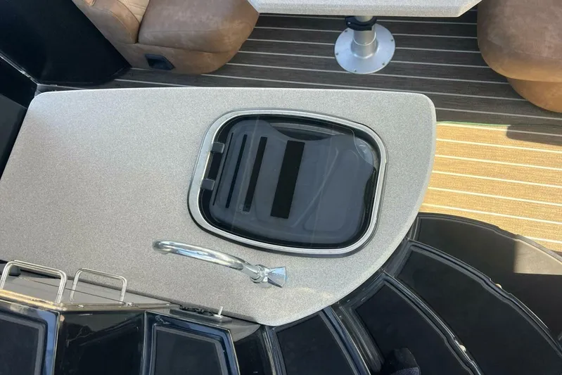  Yacht Photos Pics 2023 Premier 330 Escalante boat interior with seating and hatch detail.