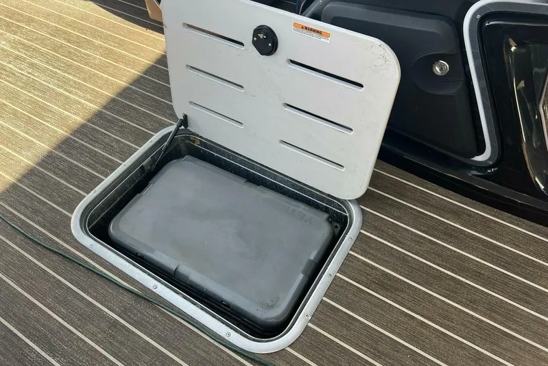  Yacht Photos Pics Open storage compartment on 2023 Premier 330 Escalante boat deck.