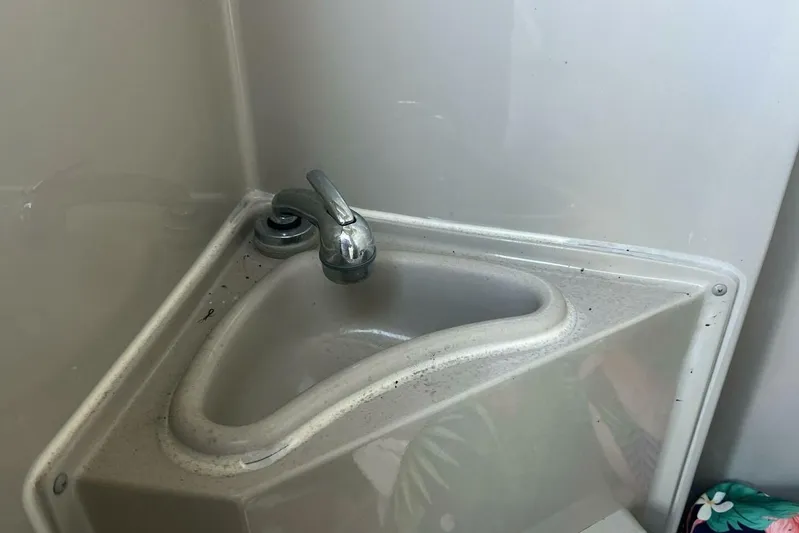  Yacht Photos Pics Compact corner sink with faucet in 2023 Premier 330 Escalante RV bathroom.