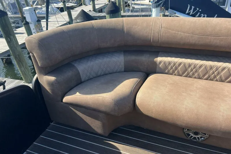  Yacht Photos Pics Luxurious seating on 2023 Premier 330 Escalante boat, featuring elegant upholstery and stylish design.