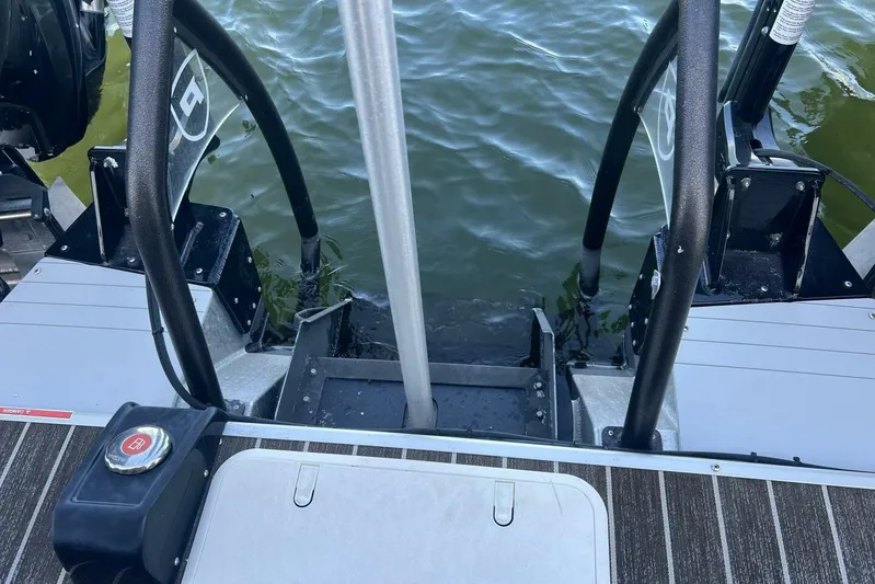  Yacht Photos Pics 2023 Premier 330 Escalante boat stern view with water and deck details.