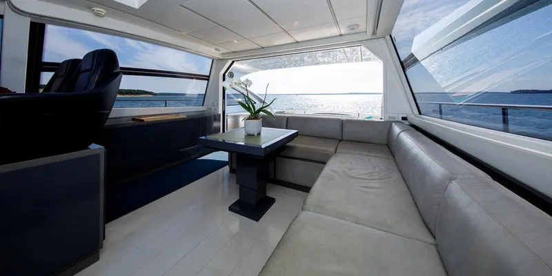  Yacht Photos Pics Luxurious interior of 2015 Pershing 62' yacht with panoramic ocean view.