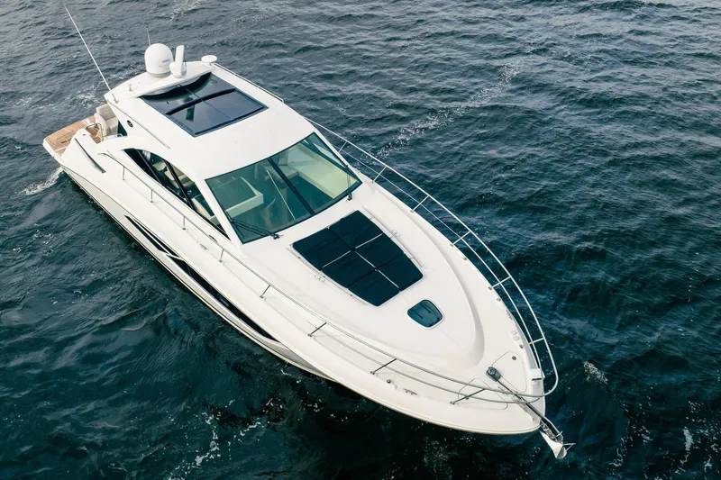 Sol E Mar IV Yacht Photos Pics 2015 Sea Ray 510 Sundancer yacht cruising on open water, aerial view.