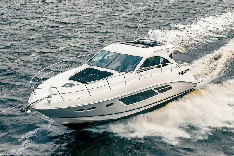 Sol E Mar IV Yacht Photos Pics 2015 Sea Ray 510 Sundancer cruising on open water, showcasing sleek design and performance.