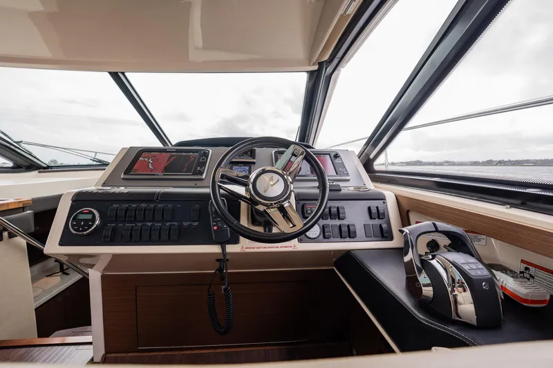 Sol E Mar IV Yacht Photos Pics Helm of 2015 Sea Ray 510 Sundancer yacht with modern controls and navigation displays.