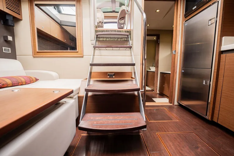Sol E Mar IV Yacht Photos Pics Interior of 2015 Sea Ray 510 Sundancer yacht with wooden stairs and modern design.
