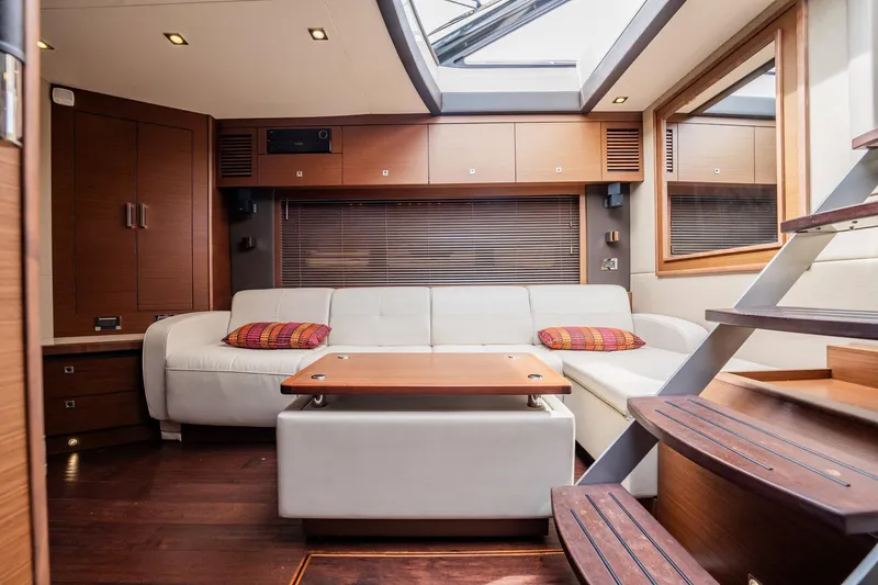 Sol E Mar IV Yacht Photos Pics Luxurious interior of 2015 Sea Ray 510 Sundancer yacht with modern furnishings.
