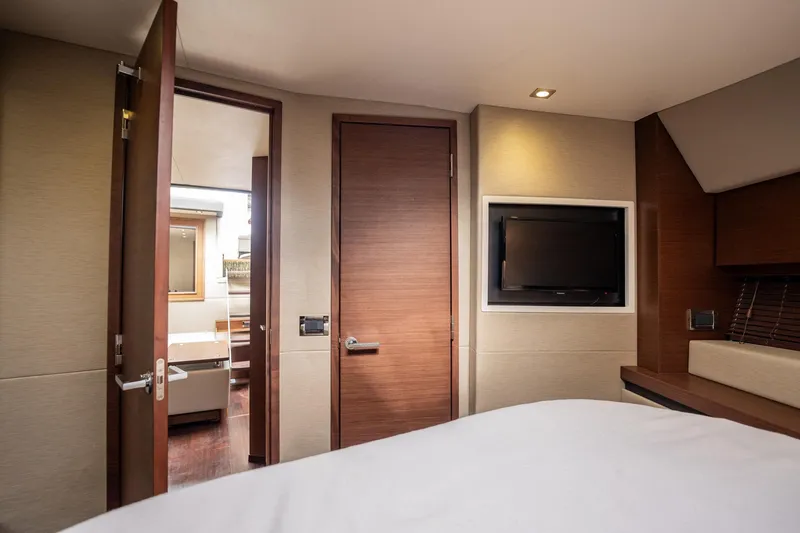 Sol E Mar IV Yacht Photos Pics Luxurious interior of 2015 Sea Ray 510 Sundancer yacht with modern design and TV.