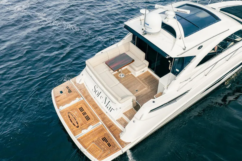 Sol E Mar IV Yacht Photos Pics 2015 Sea Ray 510 Sundancer yacht on open water, featuring elegant deck design.