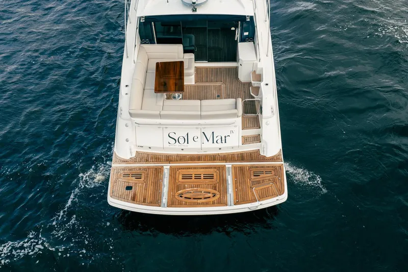 Sol E Mar IV Yacht Photos Pics 2015 Sea Ray 510 Sundancer yacht on water, featuring elegant deck and seating area.