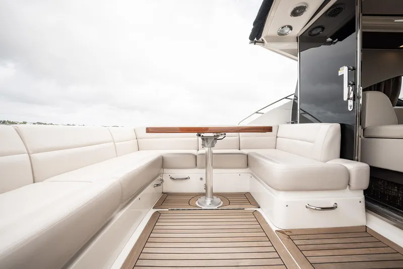 Sol E Mar IV Yacht Photos Pics Luxurious seating area on 2015 Sea Ray 510 Sundancer yacht with elegant wood accents.