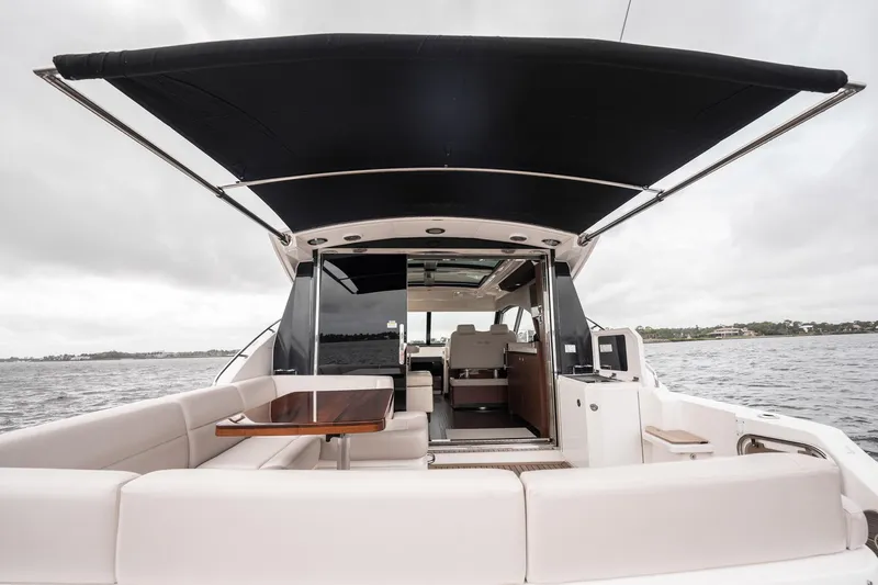 Sol E Mar IV Yacht Photos Pics 2015 Sea Ray 510 Sundancer yacht interior with seating and canopy on open water.