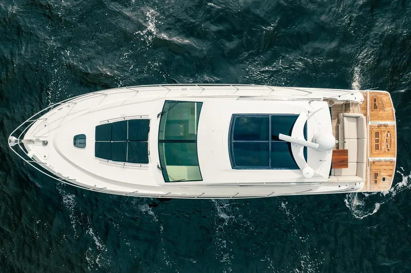 Sol E Mar IV Yacht Photos Pics Aerial view of 2015 Sea Ray 510 Sundancer yacht on open water.