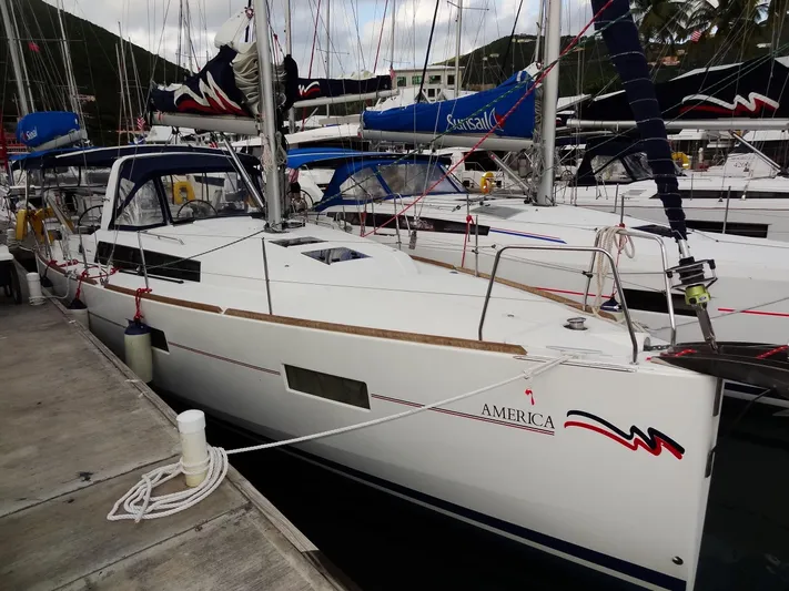 America Yacht Photos Pics 2018 Beneteau Oceanis 38 sailboat docked at marina.