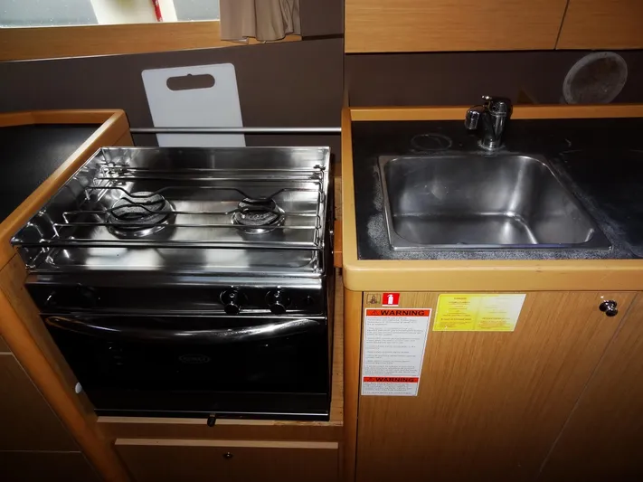 America Yacht Photos Pics 2018 Beneteau Oceanis 38 kitchen with stove and sink.