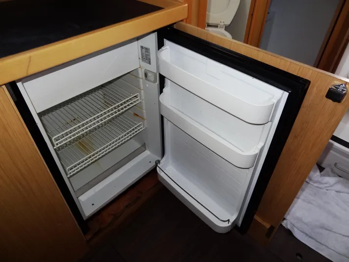 America Yacht Photos Pics Open refrigerator in the 2018 Beneteau Oceanis 38 sailboat galley.