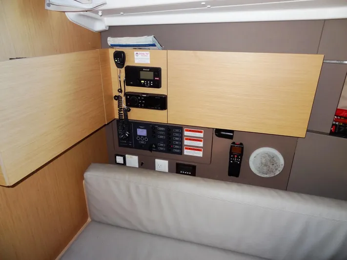 America Yacht Photos Pics Navigation and control panel inside 2018 Beneteau Oceanis 38 sailboat.