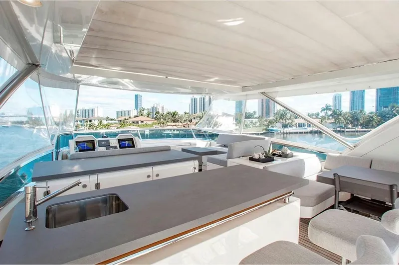 Bt2 Yacht Photos Pics Luxurious 2010 Azimut 95 yacht interior with modern seating and scenic waterfront views.