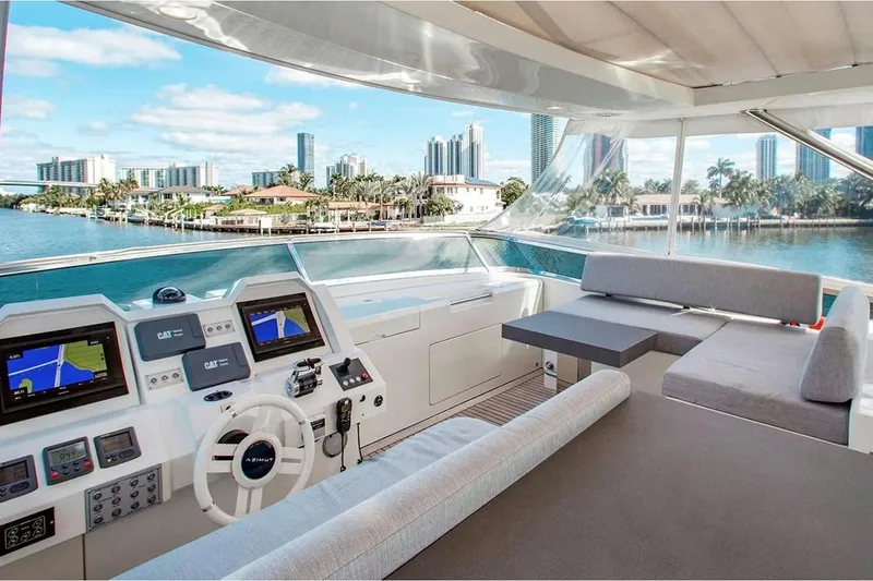 Bt2 Yacht Photos Pics Luxurious 2010 Azimut 95 yacht interior with modern helm and scenic waterfront view.