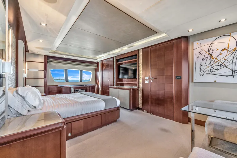 Bt2 Yacht Photos Pics Luxurious interior of 2010 Azimut 95 yacht with elegant bedroom and modern decor.