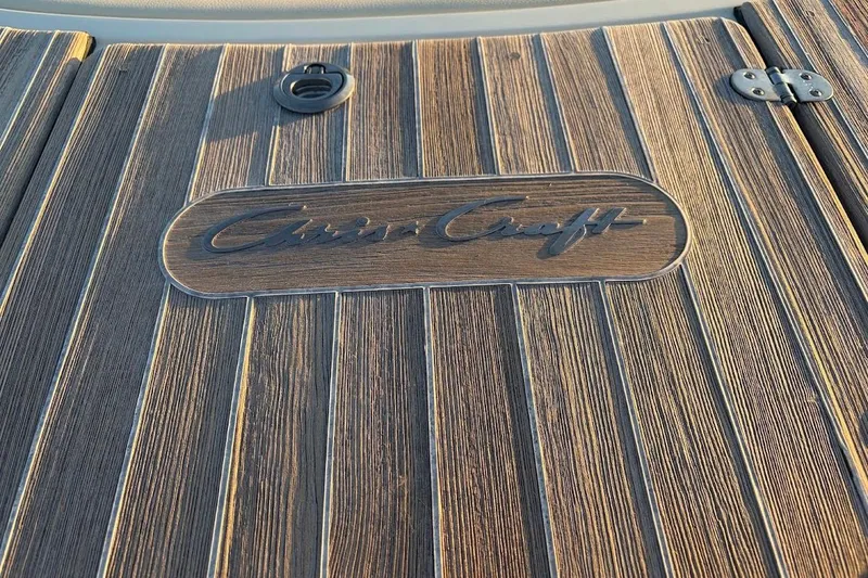  Yacht Photos Pics Teak deck of 2020 Chris-Craft Launch 28 with logo engraving.