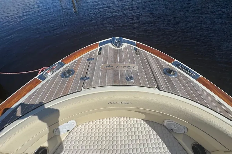  Yacht Photos Pics 2020 Chris-Craft Launch 28 boat with elegant wood deck and luxurious seating.