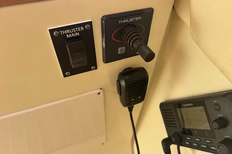  Yacht Photos Pics Control panel of a 2020 Chris-Craft Launch 28 boat with thruster and Garmin device.