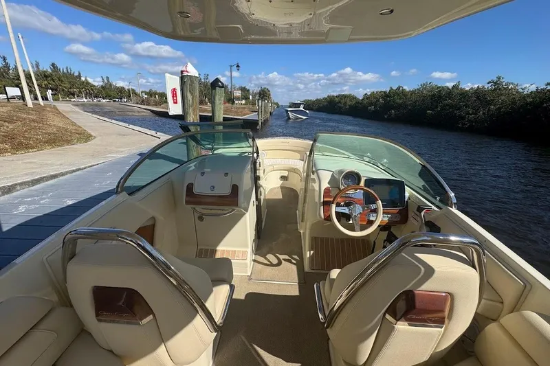  Yacht Photos Pics 2020 Chris-Craft Launch 28 boat interior with luxurious seating and modern dashboard.