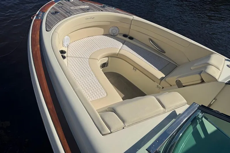  Yacht Photos Pics 2020 Chris-Craft Launch 28 boat with elegant beige seating and wooden accents.