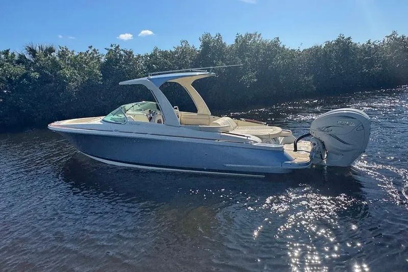  Yacht Photos Pics 2020 Chris-Craft Launch 28 boat on calm water, sunny day.