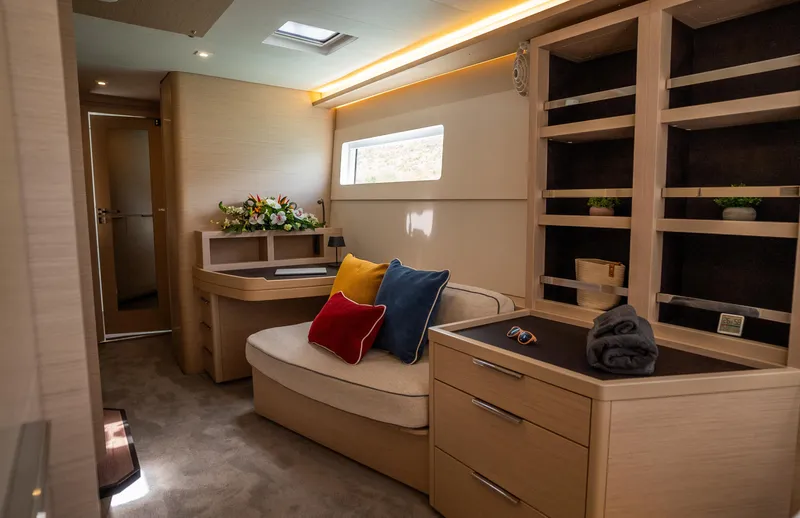 Infinity Yacht Photos Pics Luxurious interior of 2023 Lagoon 46 yacht with cozy seating and elegant decor.