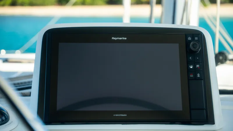 Infinity Yacht Photos Pics Raymarine navigation display on 2023 Lagoon 46 yacht, with ocean background.