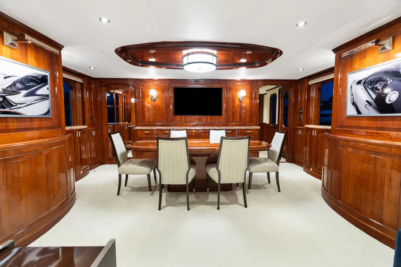 Driven Yacht Photos Pics Luxurious Conrad 88 yacht interior, 2005 model, featuring elegant wood paneling and modern lighting.