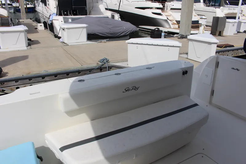 Passst Times Yacht Photos Pics 2005 Sea Ray 420 Sedan Bridge boat docked, featuring a white seating area.