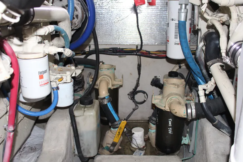 Passst Times Yacht Photos Pics Engine room of a 2005 Sea Ray 420 Sedan Bridge with various mechanical components.