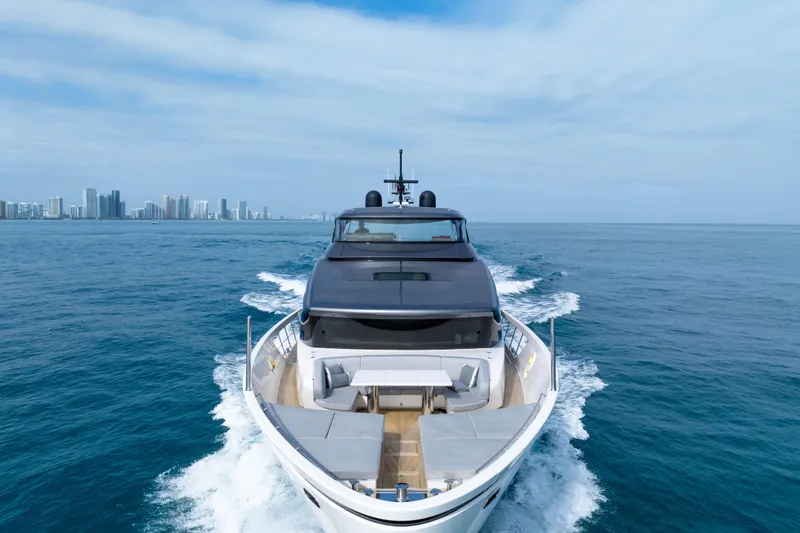 Mave Yacht Photos Pics Sanlorenzo SX88 2020 yacht cruising on open sea with city skyline in background.