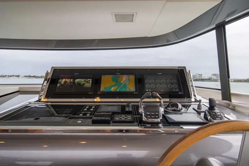 Mave Yacht Photos Pics Control panel of 2020 Sanlorenzo SX88 yacht with navigation screens and controls.