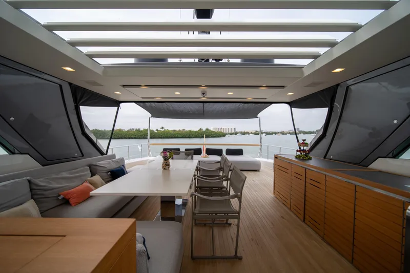 Mave Yacht Photos Pics Luxurious 2020 Sanlorenzo SX88 yacht interior with modern seating and scenic water view.