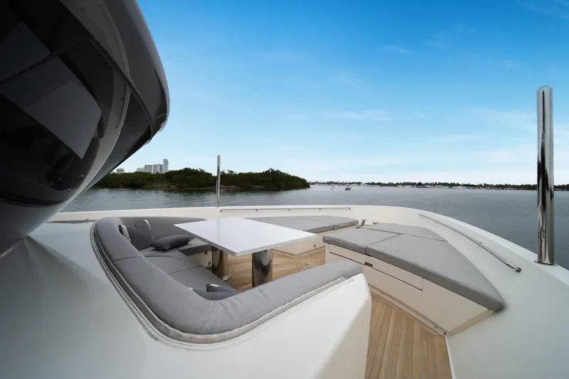 Mave Yacht Photos Pics Luxurious 2020 Sanlorenzo SX88 yacht deck with elegant seating and scenic water view.