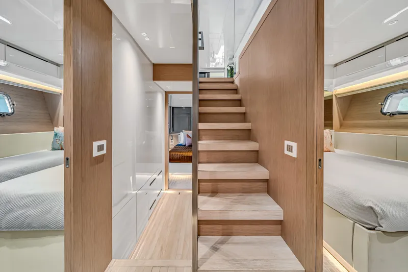 Mave Yacht Photos Pics Luxurious interior of 2020 Sanlorenzo SX88 yacht with modern design and wooden staircase.